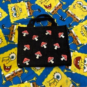 Hot Topic Black Tote with Red Mushroom Design